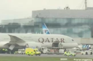 Pesawat Qatar Airways. (Foto: Tribunnews.com)