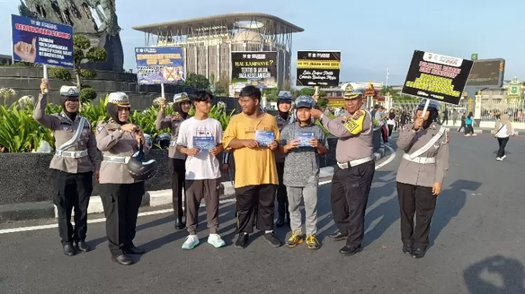 Kampanye Keselamatan Berlalu Lintas dan Pesan Pilkada Damai Meriahkan CFD Pekanbaru