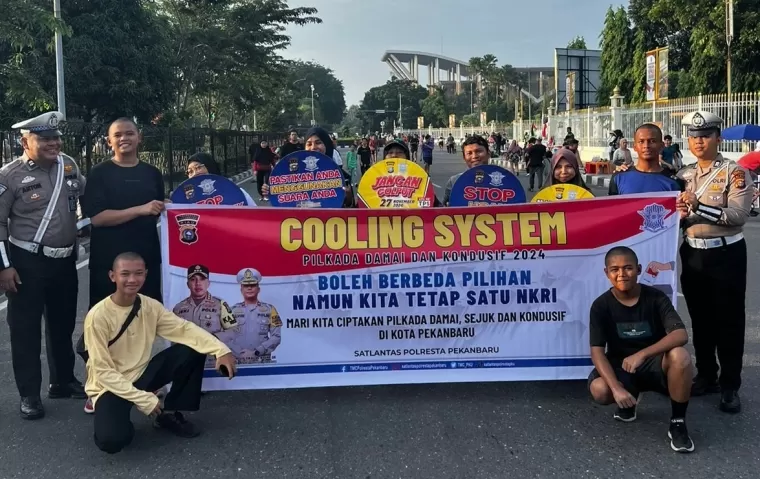 Satlantas Polresta Pekanbaru Gelar Cooling System Pengamanan CFD untuk Ciptakan Pilkada Damai 2024