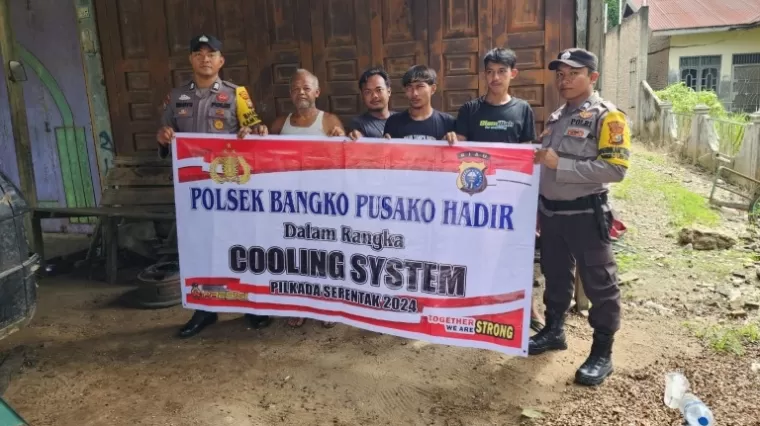 Wujudkan Pilkada Damai, Polsek Bangko Pusako Gencarkan Dialog Langsung dengan Warga