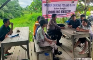 Ngobrol Santai di Warung, Polsek Bangko Pusako Bangun Pilkada Tanpa Konflik