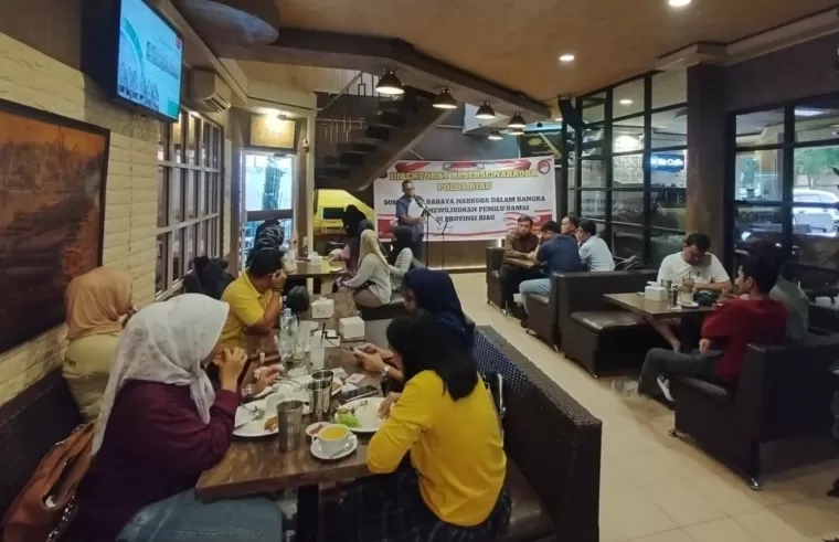 Wujudkan Pilkada Damai, Ditresnarkoba Polda Riau Sosialisasi Bahaya Narokoba di Re Cafe