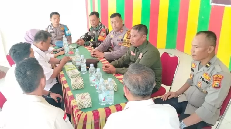 Lewat Rapat Koordinasi, Kapolsek Bangko Pusako Sampaikan Pesan Pilkada Damai