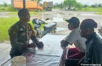 Begini Cara Aiptu M. Sihombing Ajak Warga Bangko Pusako Jaga Kamtibmas Selama Pilkada