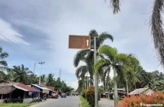 Salah satu rambu penunjuk arah tak jauh dari gerbang kota di utara Kota Pariaman.(Trisnaldi).