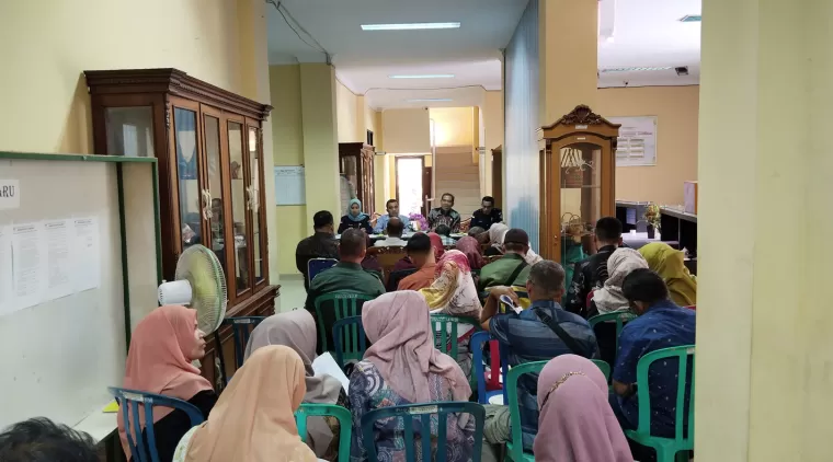 Kepala Dinas Perdagangan, Koperasi dan UMKM Rahmad Hidayat usai melaksanakan rapat koordinasi bersama panita di kantor Disdagkopukm, Sarilamak, Kamis 11 Juli 2024.