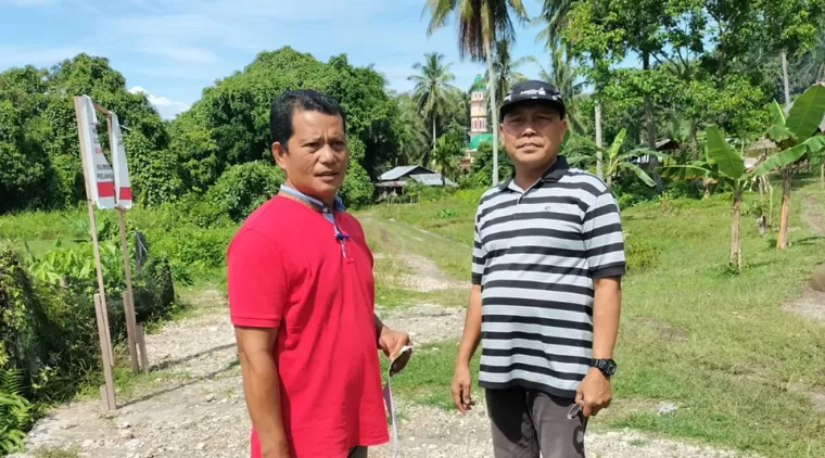 Plt Kepala Dinas Pertaniam Pangan dan Perikanan Kota Pariaman saat survei di kawasan pertanian Sungai Rambai.