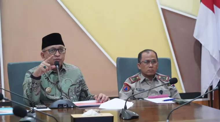 Pj Wali Kota Padang Andree Algamar Paparkan Praktik Baik Pengurangan Risiko Bencana dalam Webinar Nasional