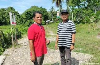 Plt Kepala Dinas Pertaniam Pangan dan Perikanan Kota Pariaman saat survei di kawasan pertanian Sungai Rambai.