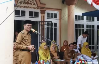 Bupati Safaruddin Dt.Bandaro Rajo di Situjuah Banda Dalam, Selasa 3 September 2024 saat membuka sosialisasi Program Kesehatan menuju UHC yang dirangkai dengan Sosialisasi Program Baznas Limapuluh Kota.