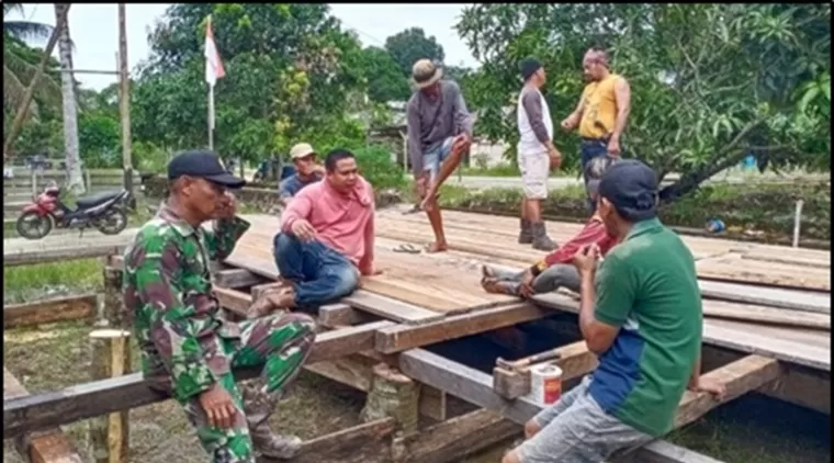 Gotong Royong dalam Aksi TMMD Ke-122 Bawa Perubahan di Desa Manjelutung