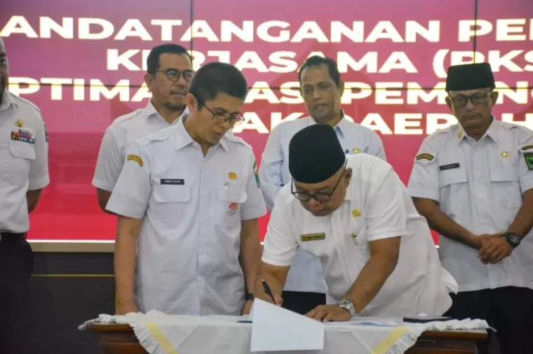 Pemerintah Provinsi Sumatera Barat menggelar acara Perjanjian Kerjasama Optimalisasi Pemungutan Pajak Daerah dan Sinergi Pemungutan Opsen Pajak Daerah