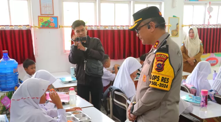 Kapolres Pessel AKBP Derry Indra, S.I.K Hadiri Peluncuran Program Makan Bergizi Gratis pertama di Kab. Pesisir Selatan