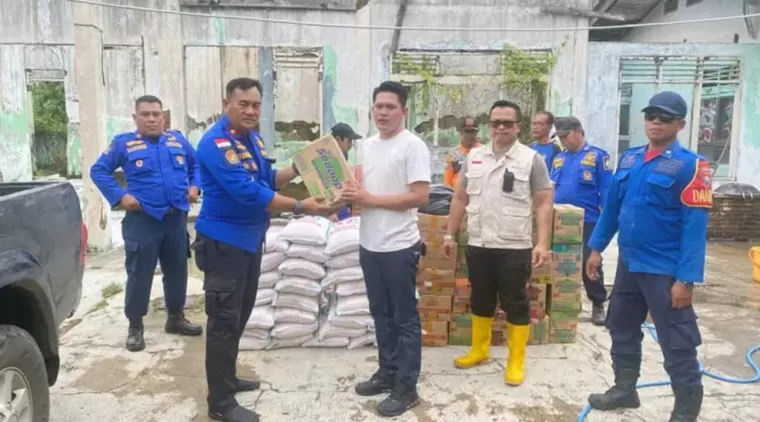 Peduli Korban Banjir, PT Axella Adhi Pratama Berikan Bantuan Sembako Untuk Masyarakat Lampung Selatan