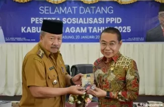 Bupati Agam, Dr. H. Andri Warman, menekankan pentingnya keterbukaan informasi publik