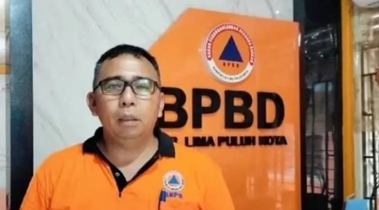 Kepala Pelaksana (Kalaksa) Badan Penanggulangan Bencana (BPBD) Kabupaten Limapuluh Kota Rahmadinol.