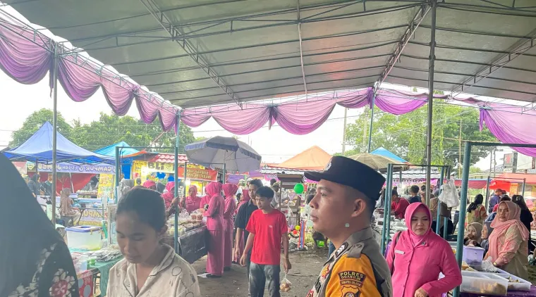 Pastikan Keamanan dan Kelancaran Jelang Buka Puasa, Polsek Tanjung Raja Laksanakan Pengamanan Pasar Bedug