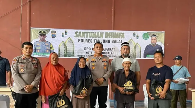 Polres Tanjung Balai Berikan Santunan Terhadap Kaum Dhuafa bersama DPD Aceh Sepakat