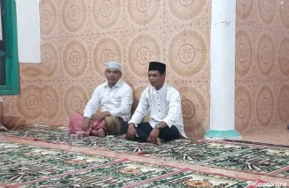 Anggota DPRD kabupaten Dharmasraya Raden Awaluddin, SE bersama Walinagari Koto Laweh Didik R Cahyadi