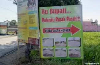 Spanduk protes warga Desa Bangle Kecamatan Kanigoro, Kabupaten Blitar.