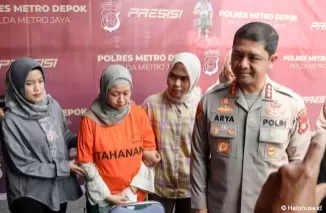 Kapolres Metro Depok Kombes Arya menanyai Maita Irianty saat Konferensi Pers