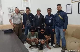 Petugas Polsuska KAI Divre II Sumbar dan pelaku percobaan pencurian saat berada di pos pengamanan Stasiun Padang. (Foto: dok. Humas KAI Sumbar)