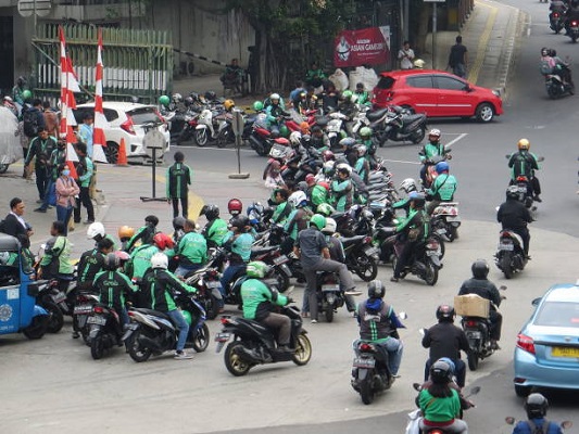 Ojek online. (Foto: Istimewa/Dok. iStock)