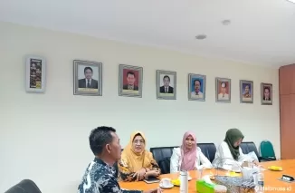 Diskusi tentang pelayanan perpustakaan