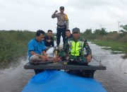 Foto Petugas di Rohil Bawa Logistik Pemilu 7 Jam Lewat Jalur Darat dan Laut