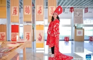 Nejjaoui perempuan Maroko memakai busana tradisional China (foto xinhua)