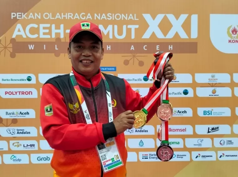 SYAFRI ANDI, Manajer yang Sukses Boyong Medali Emas Terbanyak