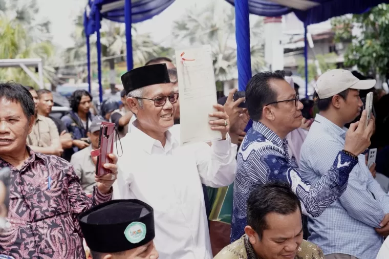 Skema HGB di Atas HPL Jadi Solusi bagi Warga Kampung Nelayan Muara Angke. Kini mereka bisa tersenyum bahagia. (ist)